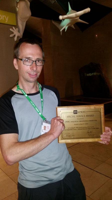 Jules receiving the Special Service Award at SPNHC2014