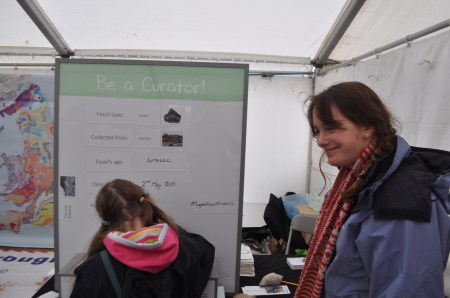 Luanne Meehitiya exploring curation with a young visitor to the festival